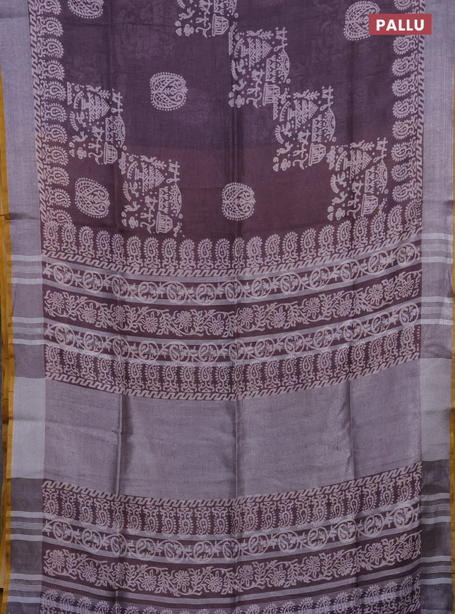 Pure linen saree pastel purple and mustard yellow with allover prints and silver zari woven border