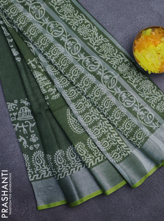 Pure linen saree sap green and yellow with allover prints and silver zari woven border