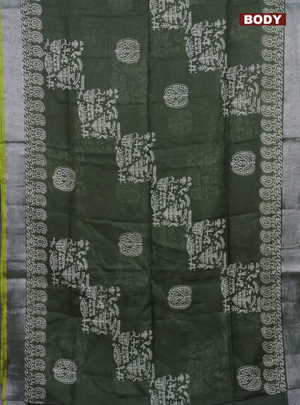 Pure linen saree sap green and yellow with allover prints and silver zari woven border