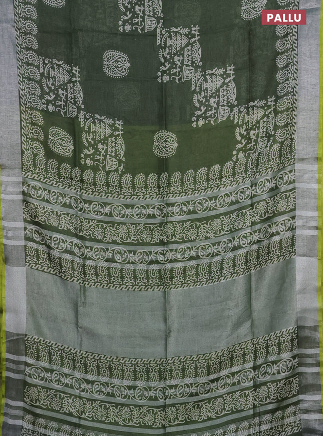 Pure linen saree sap green and yellow with allover prints and silver zari woven border