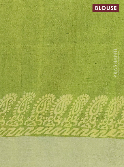 Pure linen saree sap green and yellow with allover prints and silver zari woven border