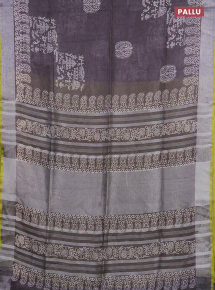 Pure linen saree greyish brown and yellow with allover prints and silver zari woven border