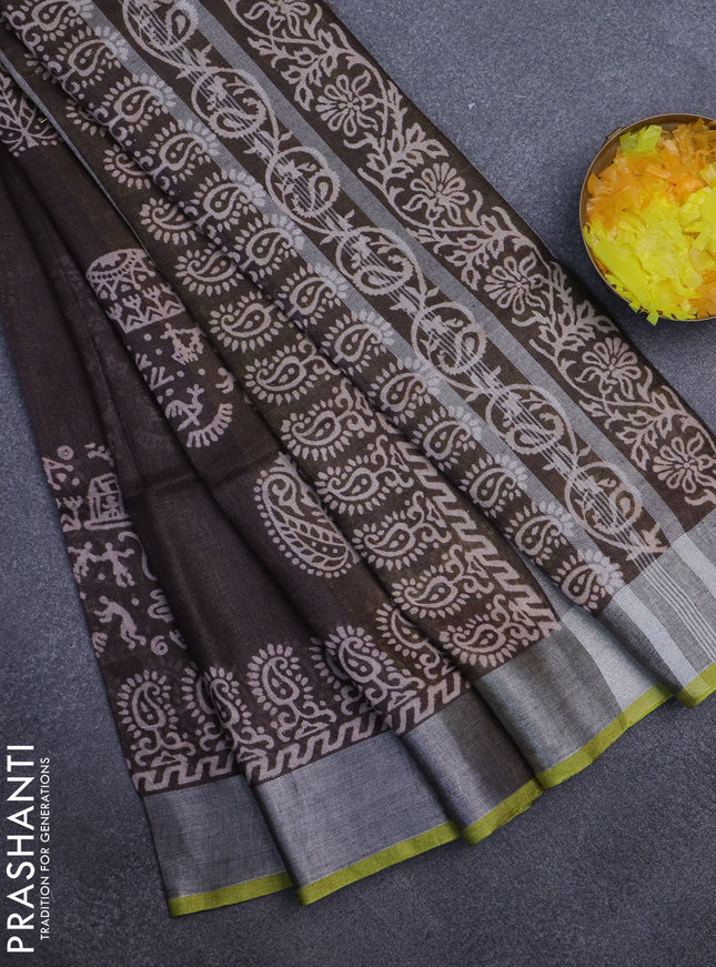 Pure linen saree brown and yellow with allover prints and silver zari woven border