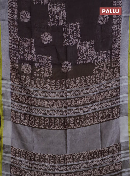 Pure linen saree brown and yellow with allover prints and silver zari woven border