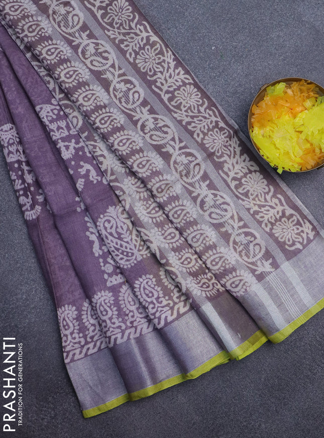 Pure linen saree pastel purple and yellow with allover prints and silver zari woven border