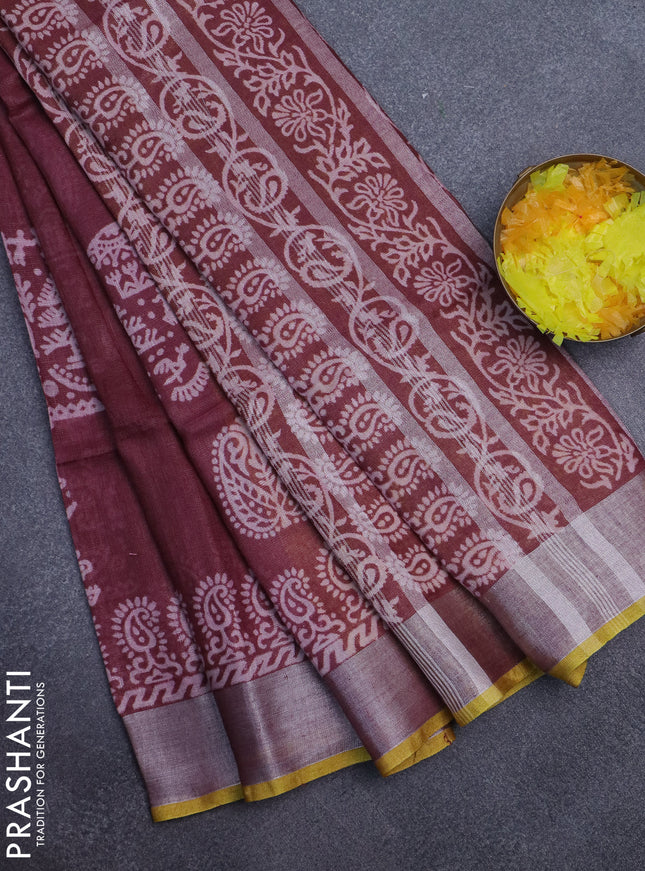 Pure linen saree maroon and yellow with allover prints and silver zari woven border