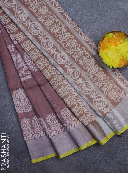 Pure linen saree pastel brown with allover prints and silver zari woven border