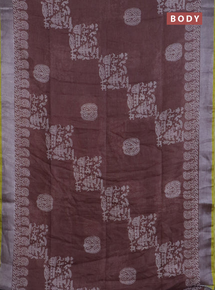 Pure linen saree pastel brown with allover prints and silver zari woven border
