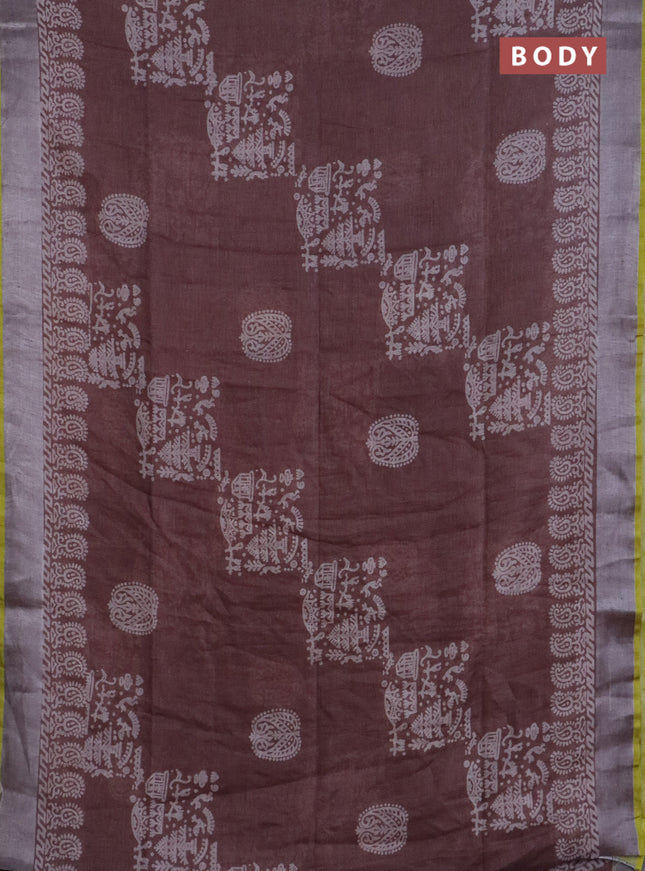 Pure linen saree pastel brown with allover prints and silver zari woven border