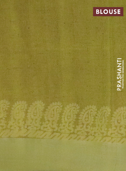 Pure linen saree pastel brown with allover prints and silver zari woven border