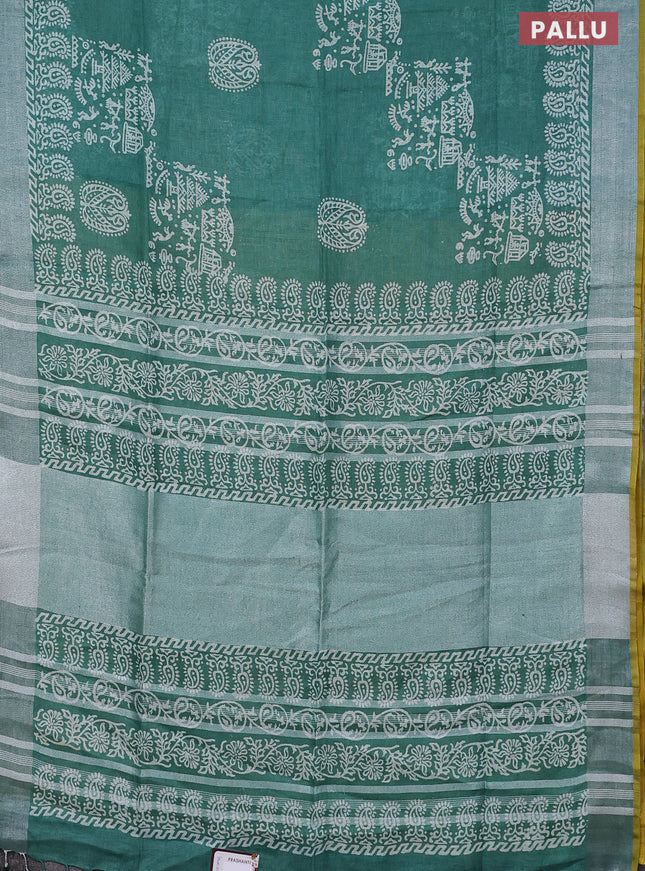 Pure linen saree green with allover prints and silver zari woven border