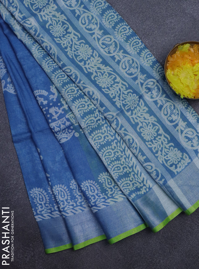 Pure linen saree blue with allover prints and silver zari woven border