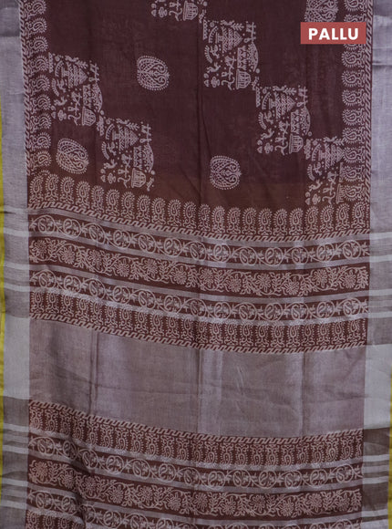 Pure linen saree coffee brown shade with allover prints and silver zari woven border