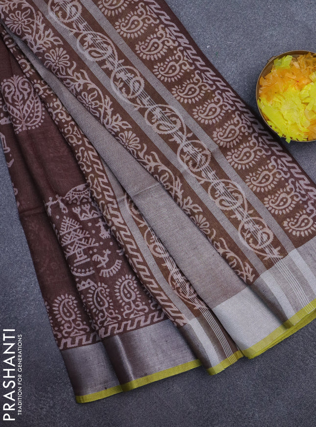 Pure linen saree brown and yellow with allover prints and silver zari woven border