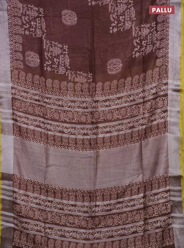 Pure linen saree brown and yellow with allover prints and silver zari woven border