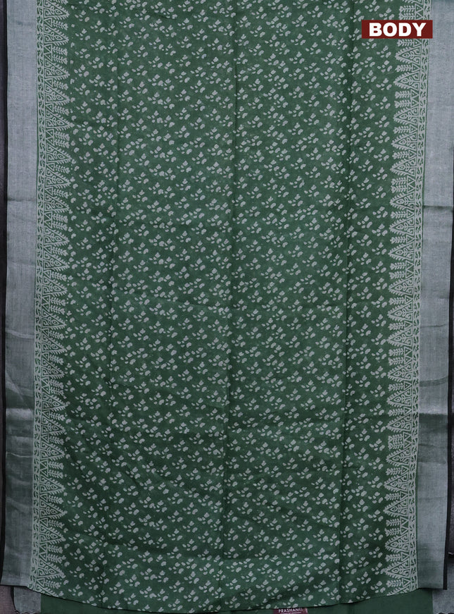 Pure linen saree green with allover prints and silver zari woven border