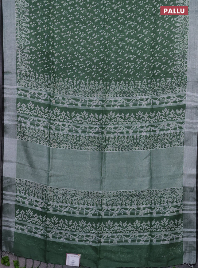 Pure linen saree green with allover prints and silver zari woven border