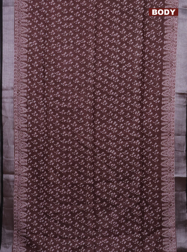 Pure linen saree coffee brown with allover prints and silver zari woven border
