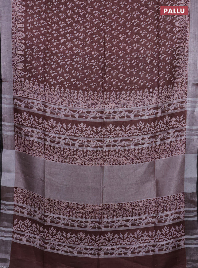 Pure linen saree coffee brown with allover prints and silver zari woven border