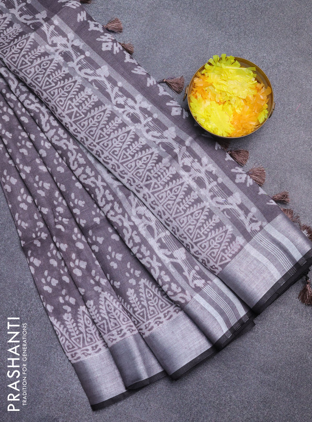 Pure linen saree grey and black with allover prints and silver zari woven border