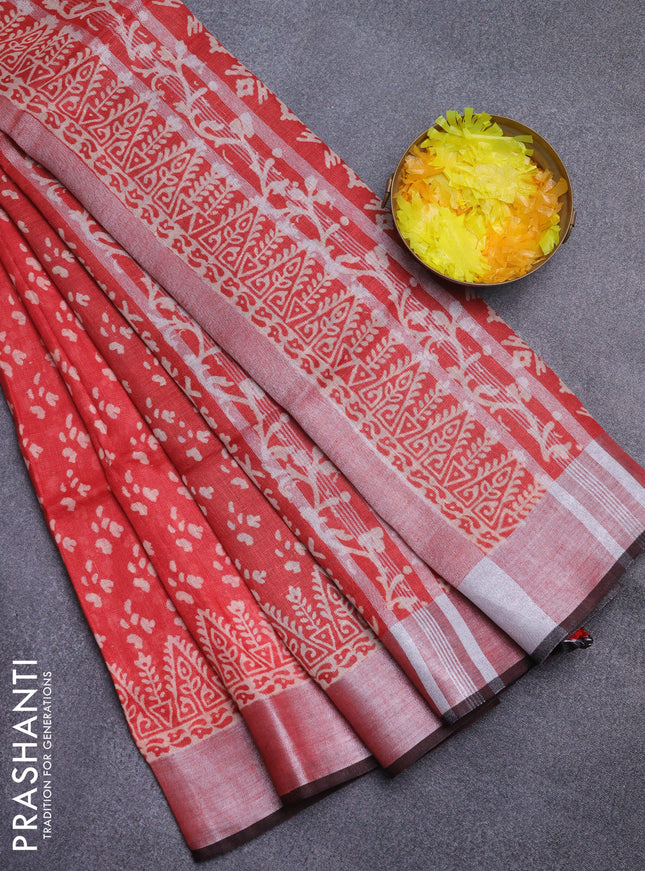 Pure linen saree red and black with allover prints and silver zari woven border