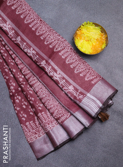 Pure linen saree deep maroon with allover prints and silver zari woven border