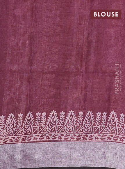 Pure linen saree deep maroon with allover prints and silver zari woven border