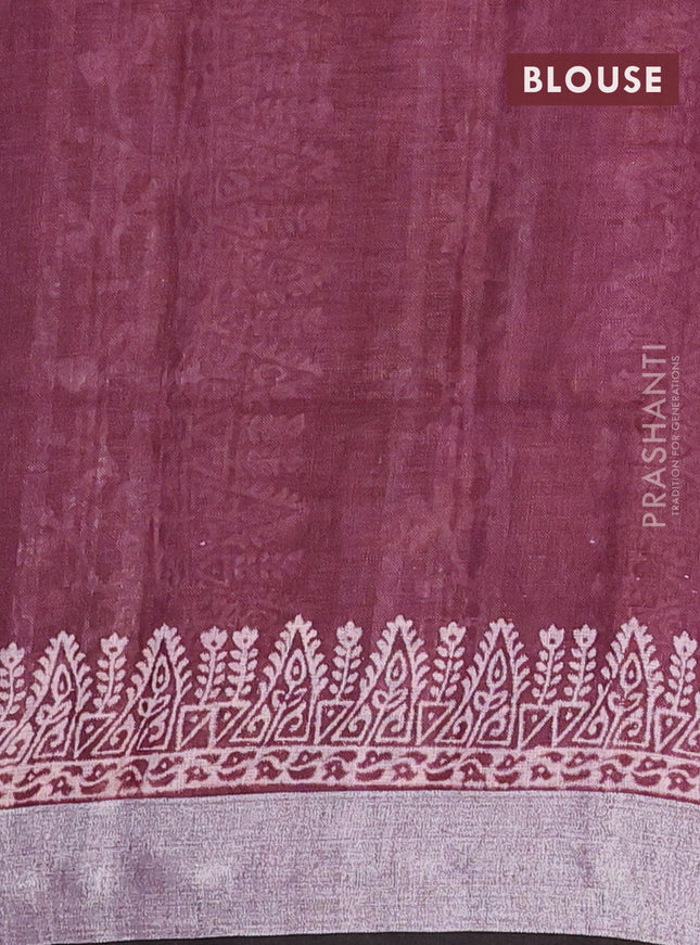Pure linen saree deep maroon with allover prints and silver zari woven border