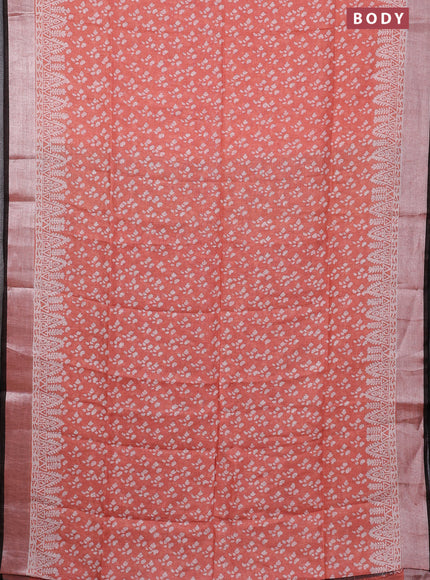 Pure linen saree orange and black with allover prints and silver zari woven border