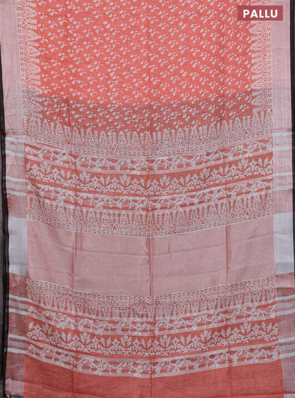 Pure linen saree orange and black with allover prints and silver zari woven border