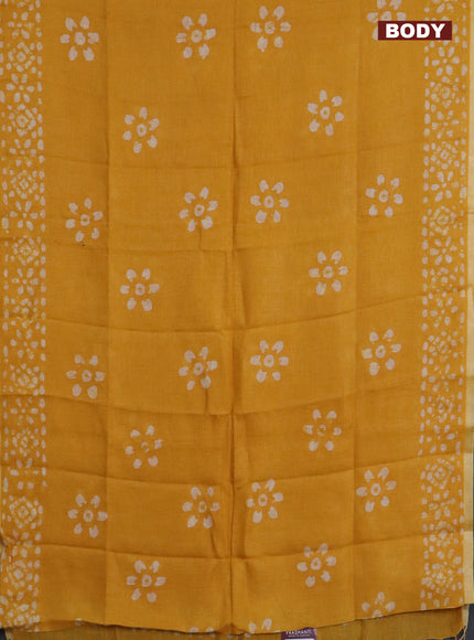 Pure linen saree yellow with batik butta prints and silver zari woven border