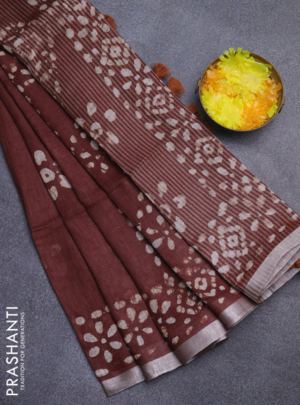 Pure linen saree brown with batik butta prints and silver zari woven border