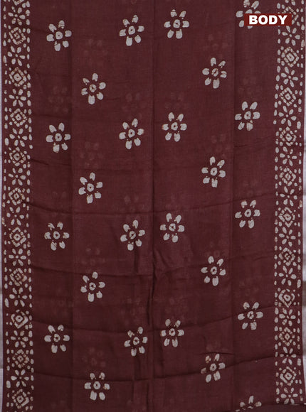Pure linen saree brown with batik butta prints and silver zari woven border