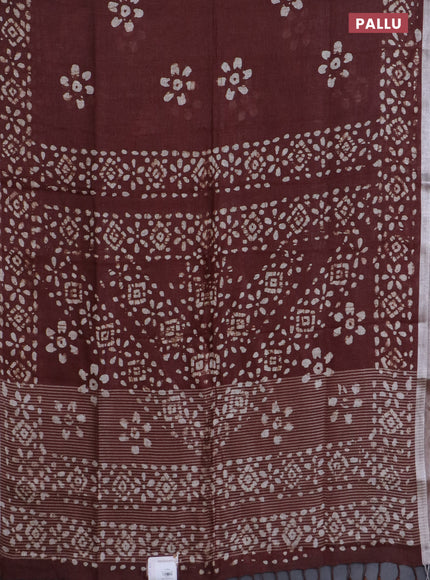 Pure linen saree brown with batik butta prints and silver zari woven border