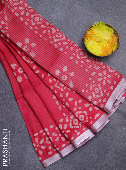 Pure linen saree pink with batik butta prints and silver zari woven border