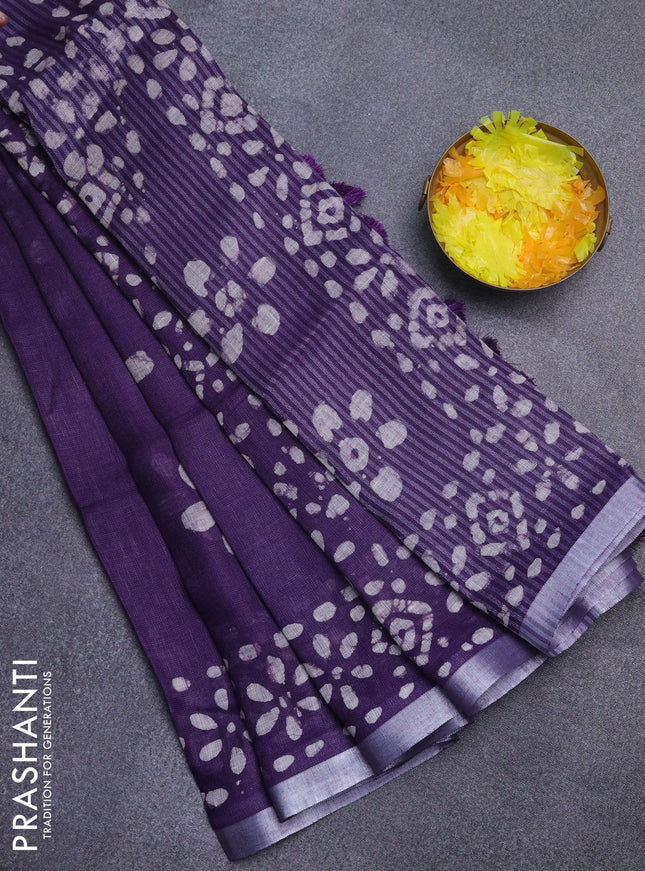 Pure linen saree deep violet with batik butta prints and silver zari woven border