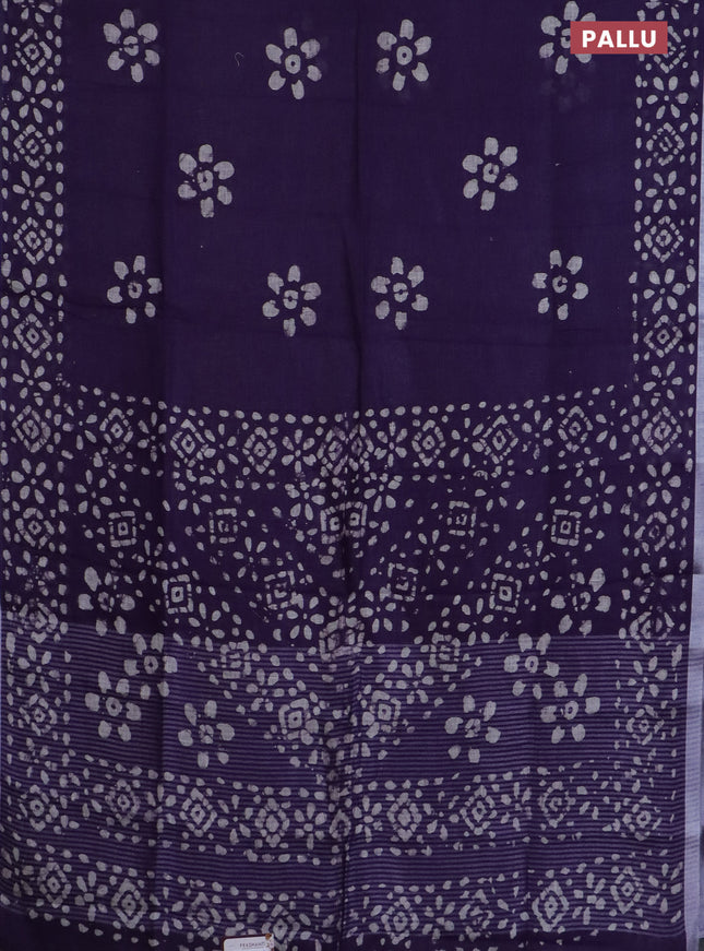 Pure linen saree deep violet with batik butta prints and silver zari woven border
