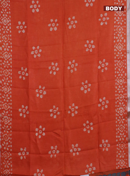 Pure linen saree orange with batik butta prints and silver zari woven border