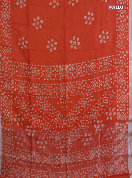 Pure linen saree orange with batik butta prints and silver zari woven border
