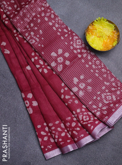 Pure linen saree deep maroon with batik butta prints and silver zari woven border