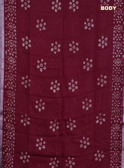 Pure linen saree deep maroon with batik butta prints and silver zari woven border