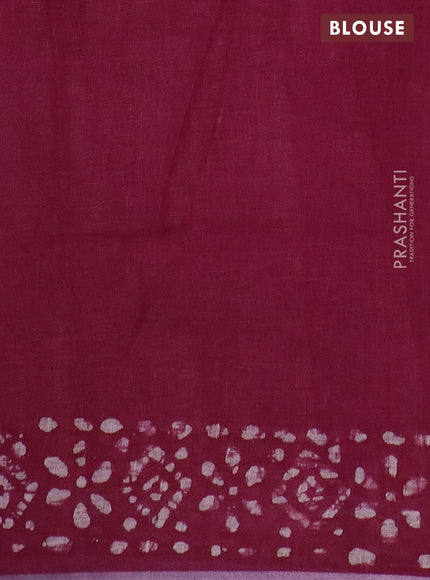 Pure linen saree deep maroon with batik butta prints and silver zari woven border