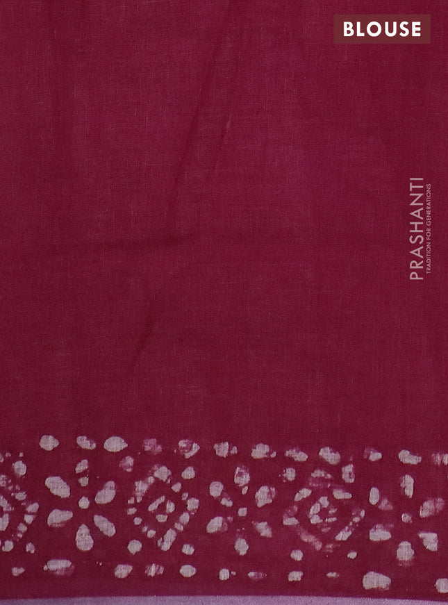 Pure linen saree deep maroon with batik butta prints and silver zari woven border