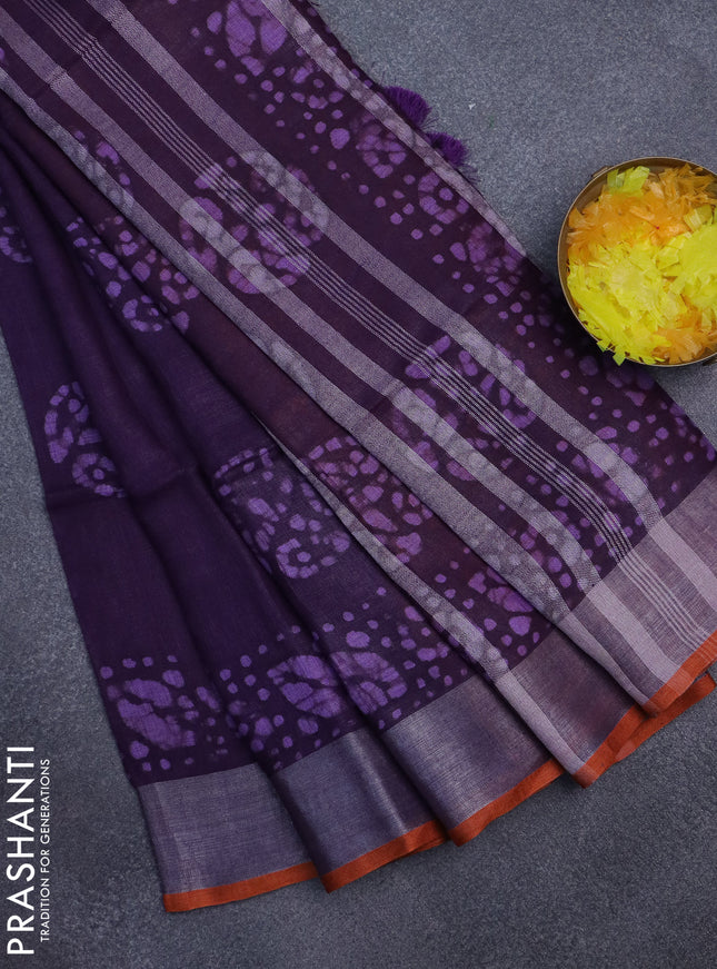 Pure linen saree deep violet with batik butta prints and silver zari woven border