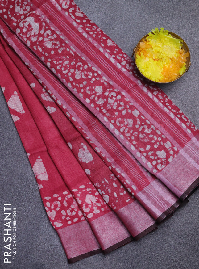 Pure linen saree dark pink and black with batik butta prints and silver zari woven border