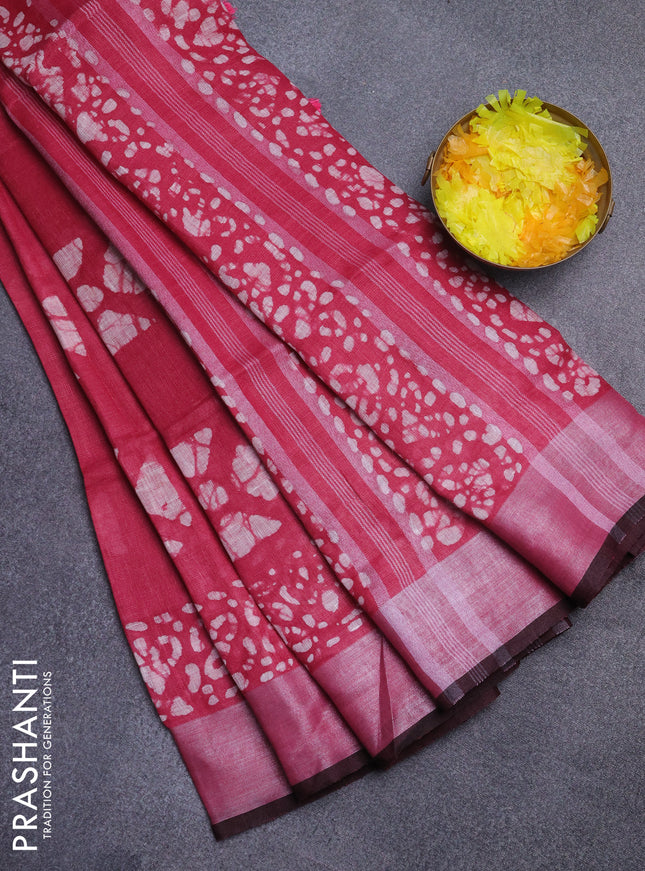 Pure linen saree dark pink and black with batik butta prints and silver zari woven border