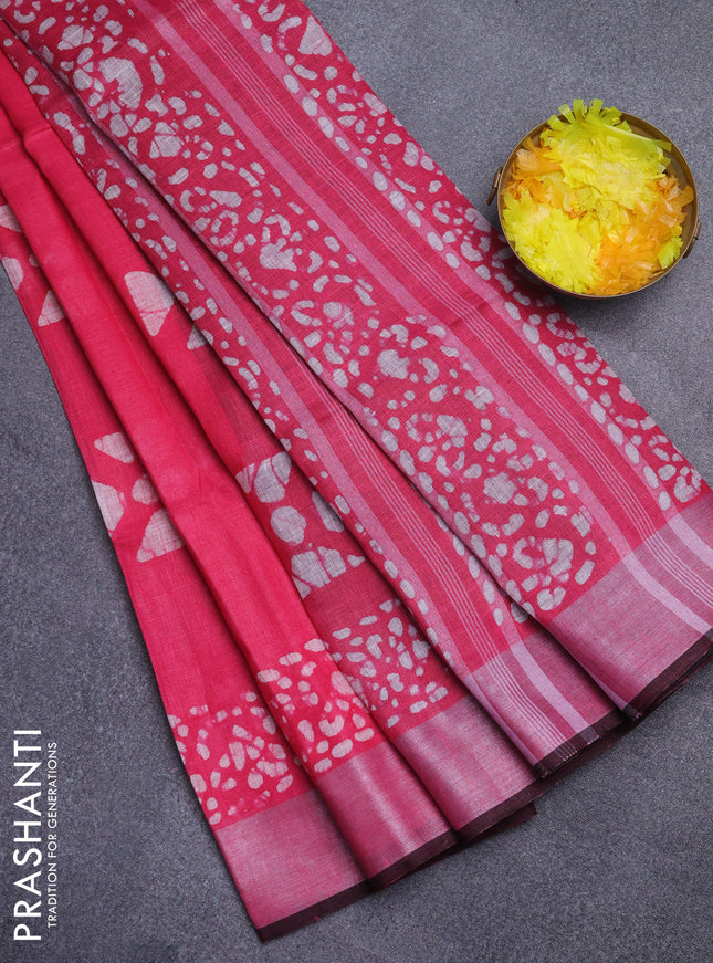 Pure linen saree pink and black with batik butta prints and silver zari woven border