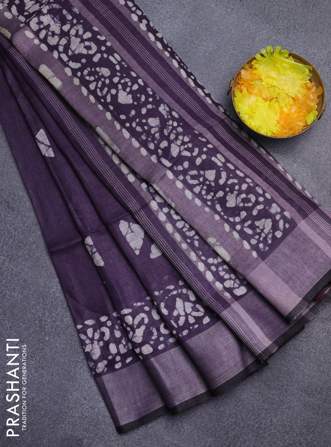 Pure linen saree deep violet and black with batik butta prints and silver zari woven border