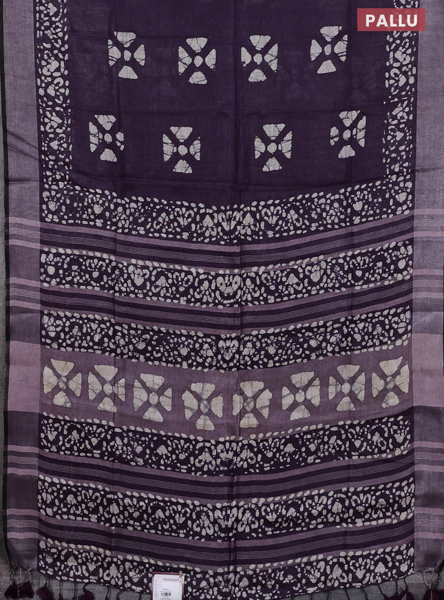 Pure linen saree deep violet and black with batik butta prints and silver zari woven border
