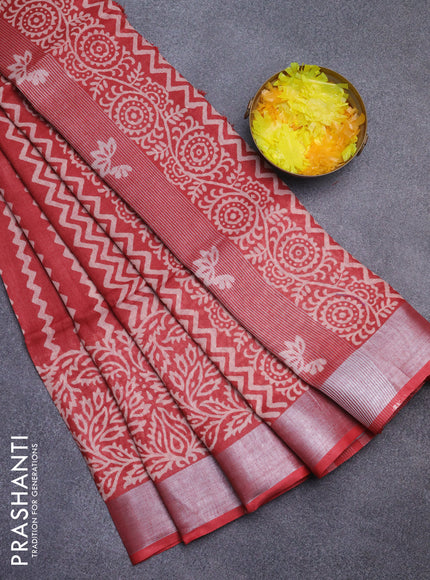 Pure linen saree maroon shade with allover prints and silver zari woven border